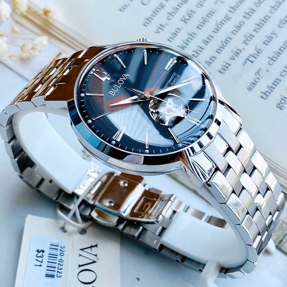 Đồng hồ mặt số xanh lộ cơ dây kim loại